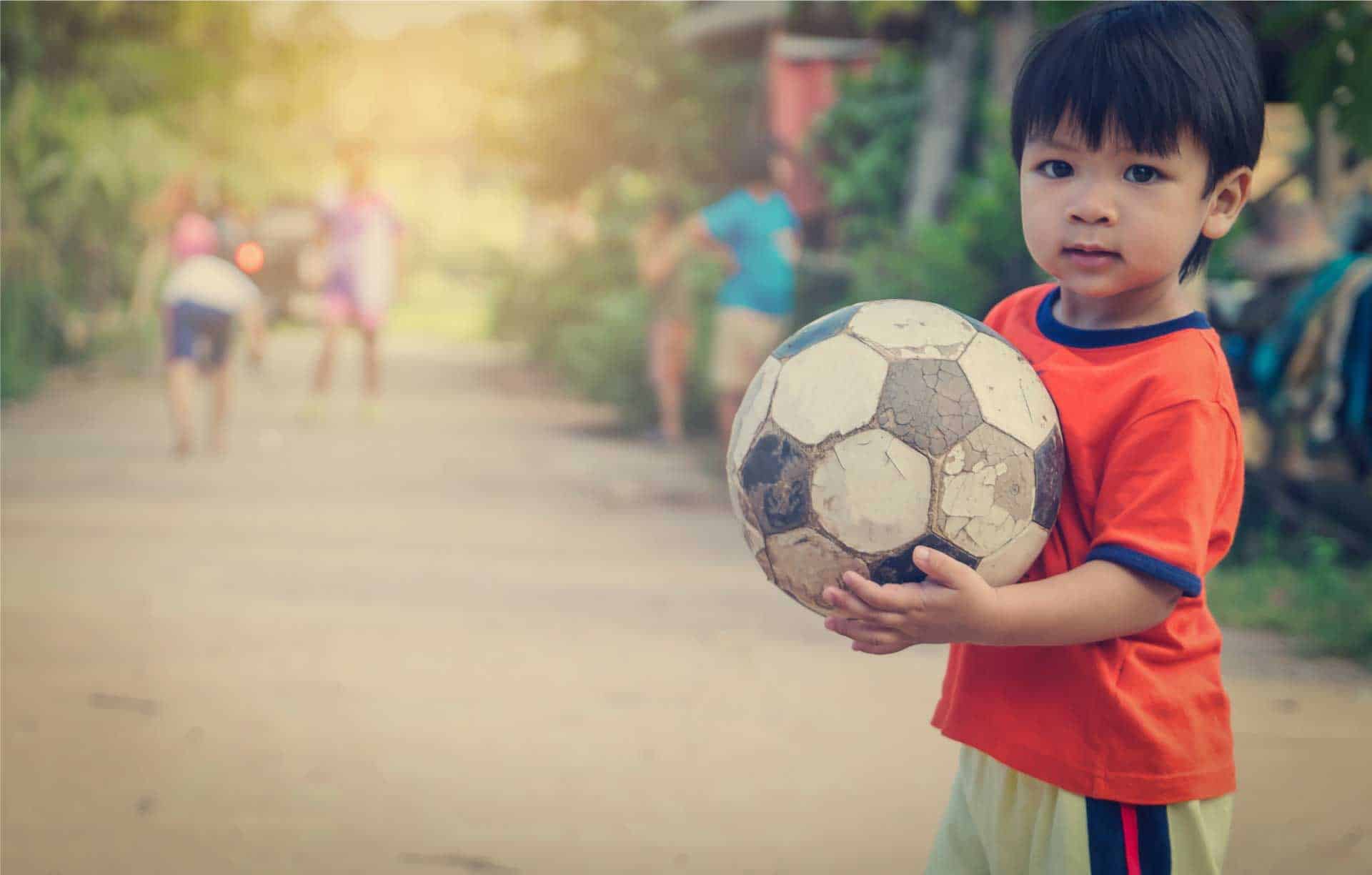 Boy With Ball Compressed.jpg