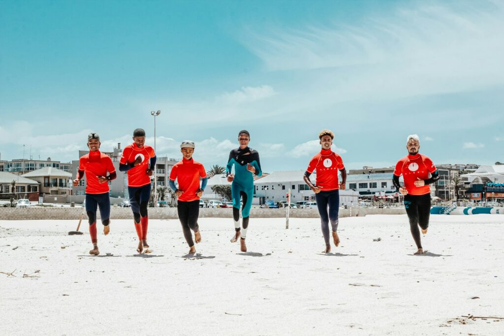 group of people on white sand beach during daytime