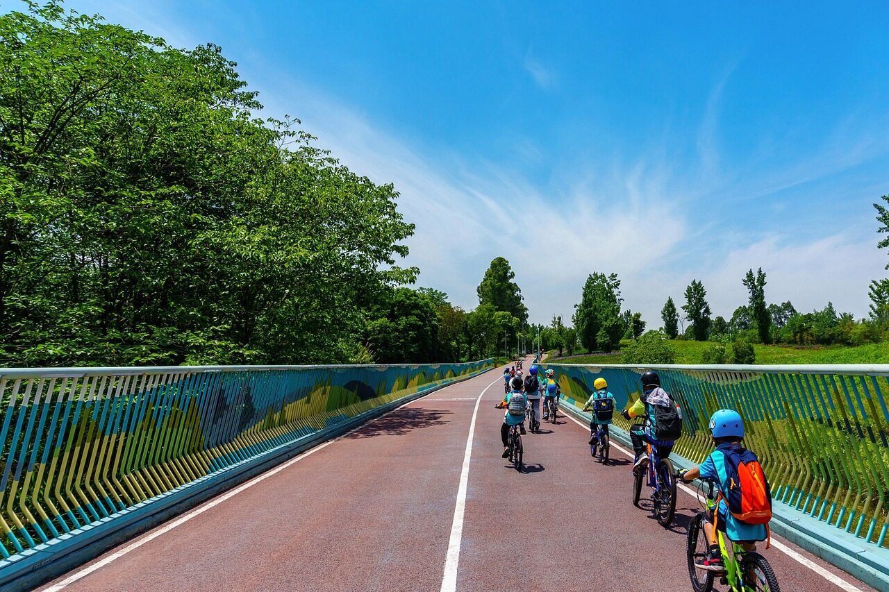 cycling, children, park, nature, path, bike lane, bike road, chengdu, china, tianfu greenway, summer, blue sky, landscape